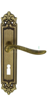 Дверная ручка Extreza TOLEDO (Толедо) 323 на планке PL02 KEY матовая бронза F03